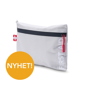 NEW PRODUCT! First aid bag with the essentials needed if an accident occurs. A thoughtful gift with a tasteful design. The first aid kit contains a triangular bandage, band-aids, tweezers, safety pins, tape, scissors, alcohol prep pad, sterile guaze swab, tourniquet, bandages and first aid guide. Can be printed on front or back. Download design sketch for more info. First aid bag is offered in red, black and light grey. It can also be ordered on trading, with your client’s colour – contact us for more info and for a quote!