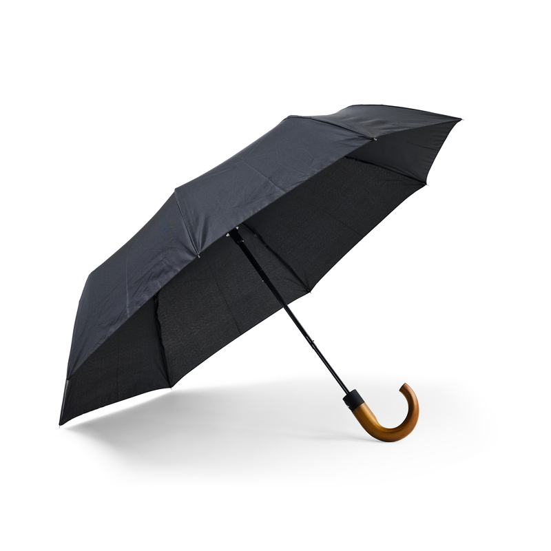 A sturdy compact umbrella with a strong wooden crutch. The frame in metal and graphite/fiberglass rods at the very ends make the construction more resistant to winds. The panels are reversible. The umbrella has automatic folding and a three-part black steel shaft.